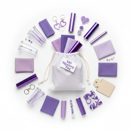 A mystery bag filled with assorted craft blanks and projects in purple brand colours